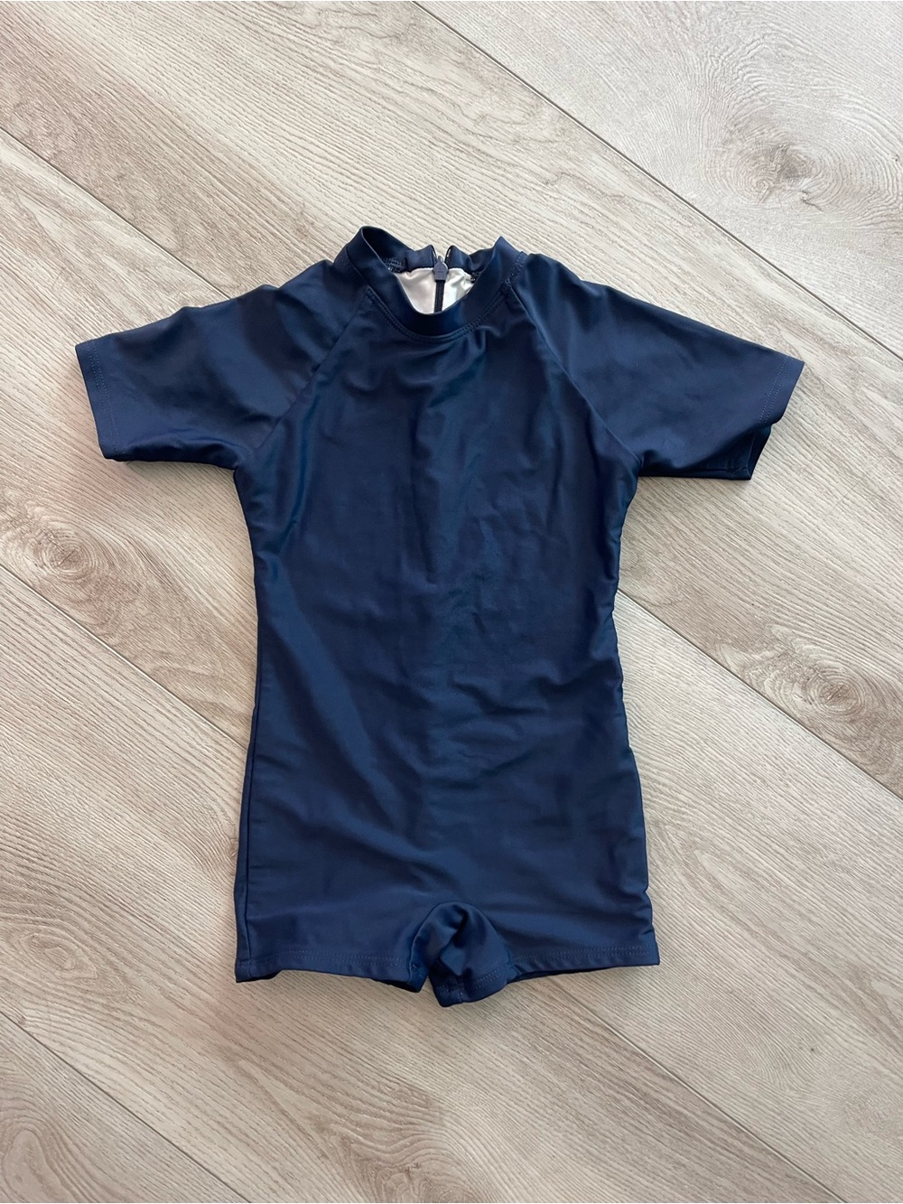Minnow unisex midsummer navy rashguard one piece, size 3/4T EUC